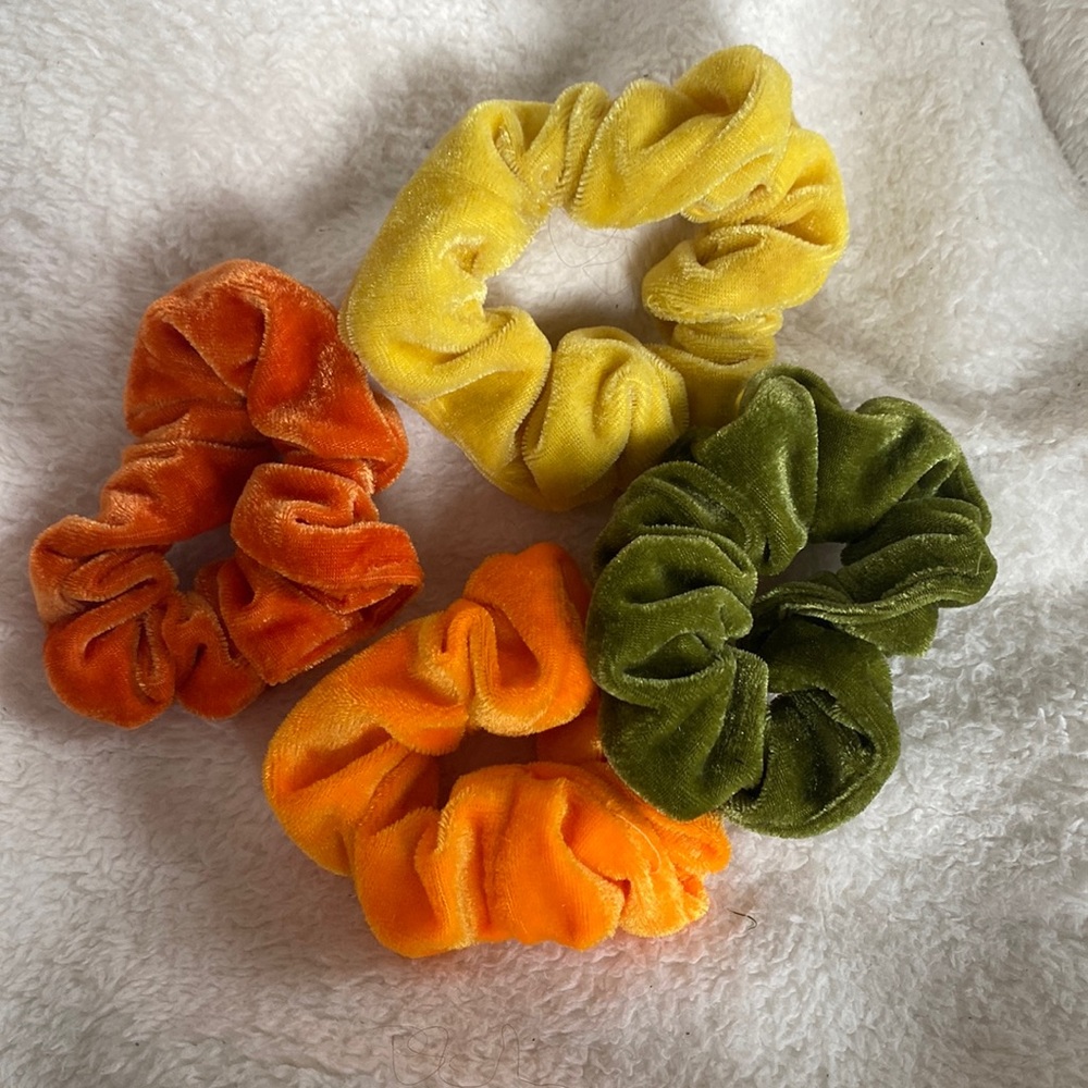 orange, yellow, and green felt scrunchies